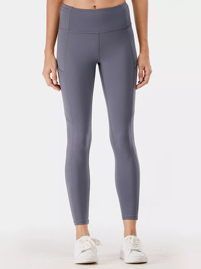 Full Size High - Waisted Active Leggings with Pockets Plus Size - L’atelier Sublime