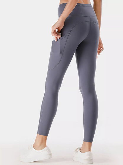 Full Size High - Waisted Active Leggings with Pockets Plus Size - L’atelier Sublime